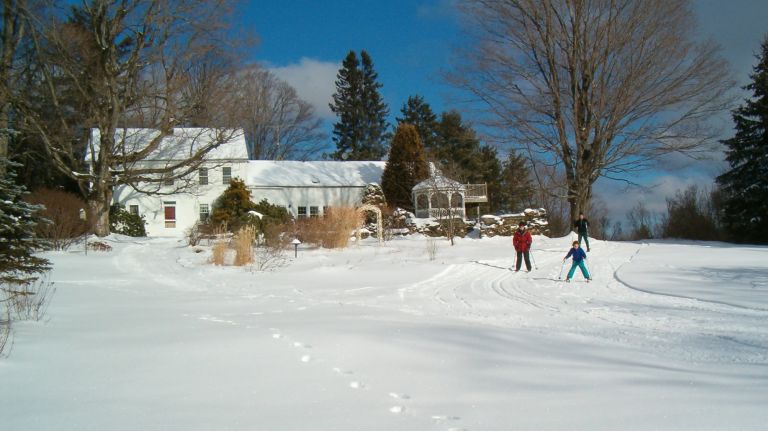 Canterbury Farm's winter activities include cross-country skiing, snowshoeing and ice skating on a frozen pond.