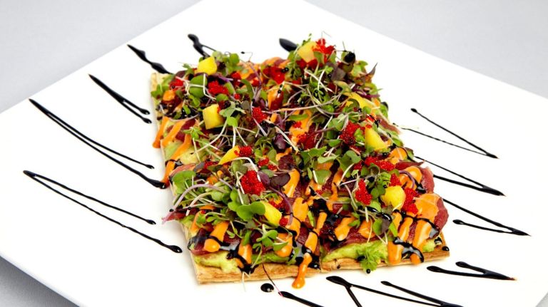 Cultural cuisines get mashed up on restaurant menus across New York City 5 Natsumi Tapas in Gramercy Park fuses Italian and Japanese cooking in a setting designed for communal dining.