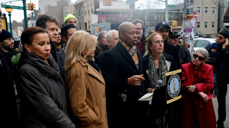New L train shutdown plans spark 'more questions than answers,' pols say 2 Brooklyn Borough Presidney Eric Adams, center, calls for more public hearings on Gov. Andrew Cuomo's new L train rehabilitation plan alongside other elected officials on Sunday.