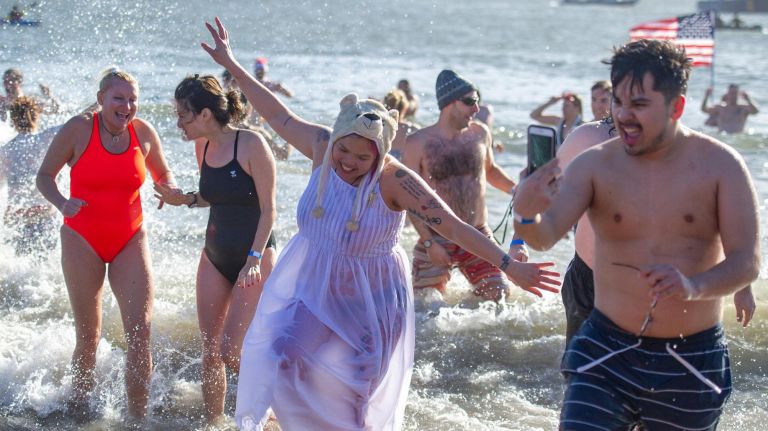 3,500-plus 'polar bears' plunge into the water off Coney Island 2 The 115th annual Coney Island pluge saw thousands participate.