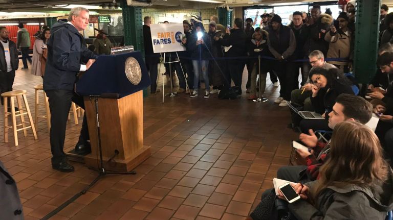 Details about the Fair Fares program providing half-priced MetroCards to low-income New Yorkers were unveiled by Mayor Bill de Blasio on Friday at the 125th Street subway station in Manhattan.