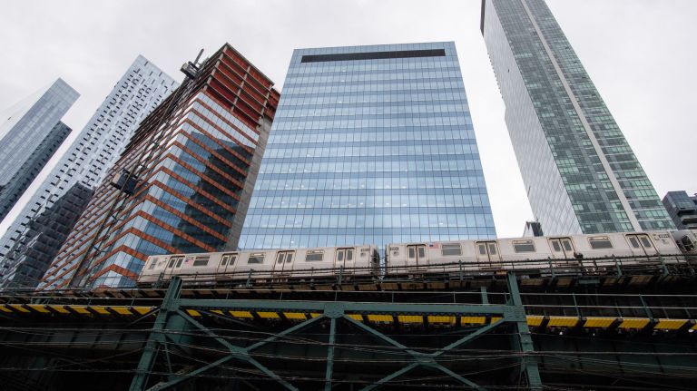 A falling beam from the 7 train's elevated tracks in Queens crashed through the windshield of a passing vehicle Thursday.