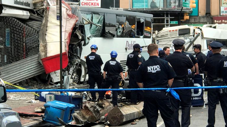 A charter bus struck an MTA bus on Northern Boulevard&nbsp;and Main Street in Flushing, on Sept. 18, 2017, killing three people and injuring 17, police said.