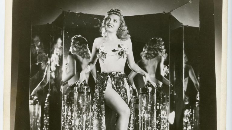 Madam Tirza was a burlesque dancer who became a licensed plumber and trucker in order to haul her 1,200-pound "wine fountain" around the country. Oral histories say Tirza was queer like many of the women she hired at Coney Island during her time there, according to the Brooklyn Historical Society.