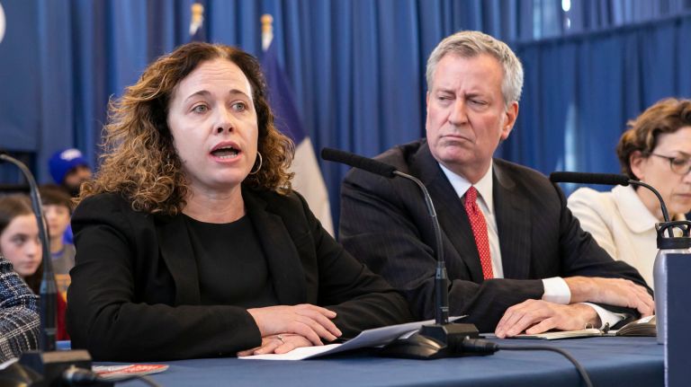 Vision Zero to update traffic signals at 300 intersections, Mayor de Blasio says 2 Maureen Landers, of Brooklyn, left, was hit by a car 2009 and her son was hit by a car last March. She is joined by Mayor Bill de Blasio at a Vision Zero press conference on Tuesday.