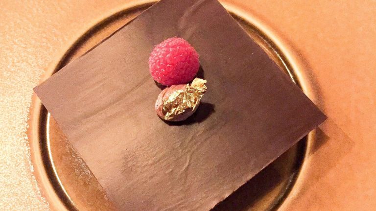 Blackbarn serving World Leader menu starting Presidents Day weekend 5 Chocolate caramel tart with gold leaf and raspberry coulis, prepared for former President George W. Bush in 2007.