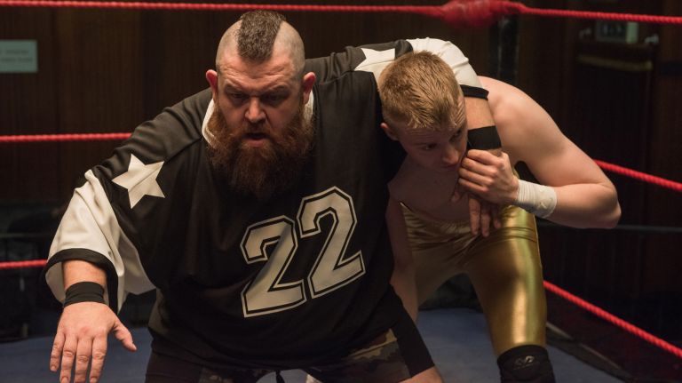 Nick Frost, left, stars as wrestling patriarch Ricky Knight in "Fighting With My Family." 