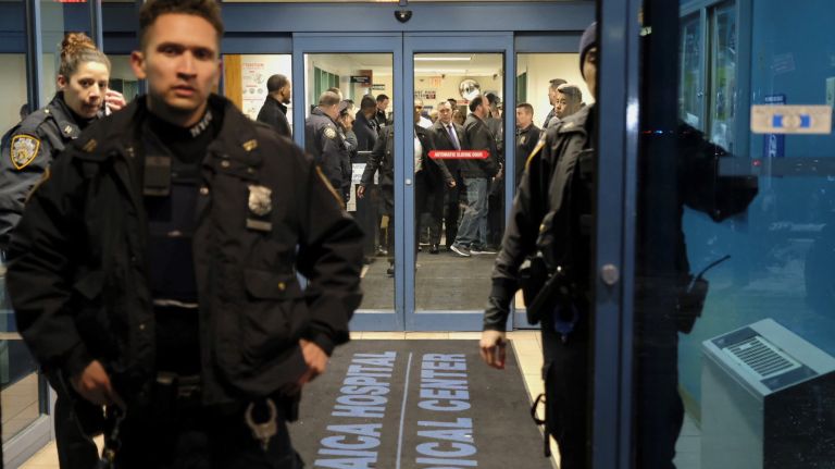 NYPD detective shot and killed in Queens, sergeant injured, officials say 6 Members of the NYPD crowd the lobby of Jamaica Hospital Medical Center on Tuesday.