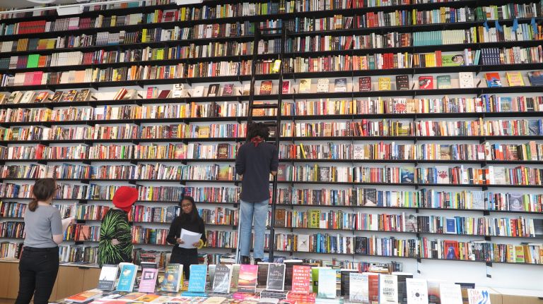 The Center for Fiction's bookstore is filled to the ceiling with novels.