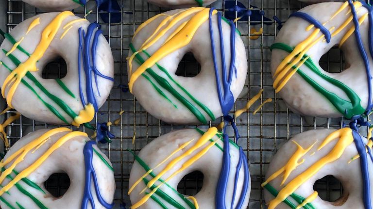 Underwest Donuts are serving king cake doughnuts for Mardis Gras.
