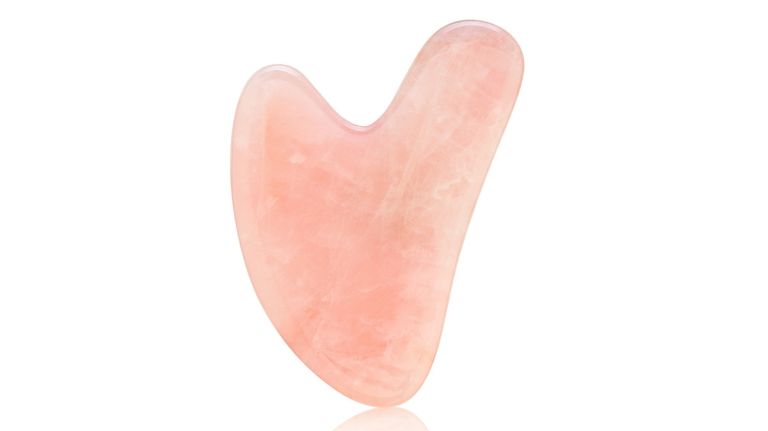 Solaris Laboratories' Gua Sha facial massage tool is, fittingly, the love stone rose quartz.