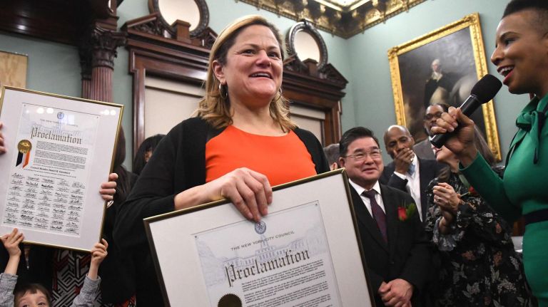 Former City Council Speaker Melissa Mark-Viverito receives a proclamation at her final address to the council on Dec. 19, 2017.
