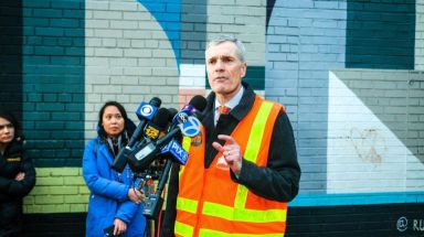 Pat Warren, the MTA's chief safety officer, discusses the fumes along the L line from outside the Graham Avenue station on Wednesday evening.