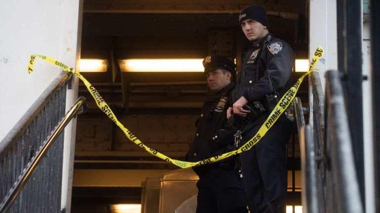 Man fatally shot in head on Queens subway platform: NYPD 2 Police stand guard at the scene at the 90th Street-Elmhurst Avenue subway station in Queens where a person was shot in the head and killed Sunday.