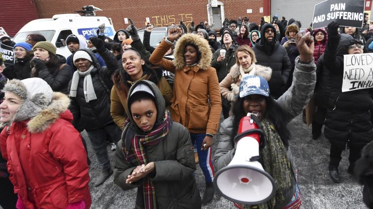 Protesters, seen here on Saturday, rally outside the Metropolitan Detention Center.