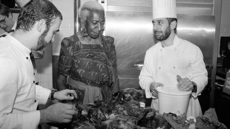 Edna Lewis, center, pictured with Felipe Rotas-Lombardi, left, and&nbsp;Mark Miller at the American Chefs' Tribute to James Beard in 1985.