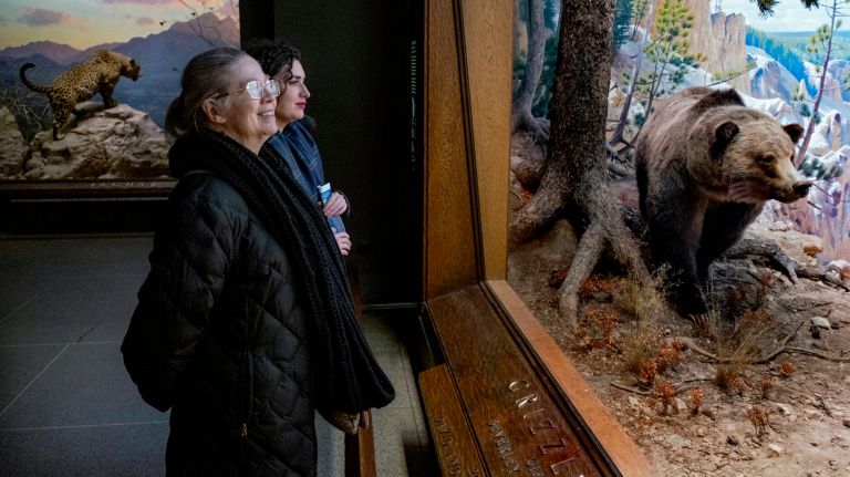 Actress and writer Shana Casey of Manhattan, a Cultured Companion,&nbsp;spends time with Mary Bess Spurlock, 77, of Manhattan, as they walk about the American Museum of Natural History.
