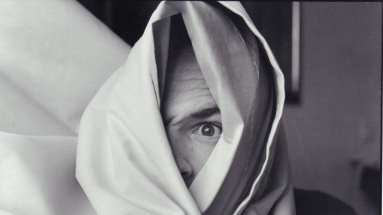Perry, wrapped in a hotel curtain on Feb. 21, 1994.