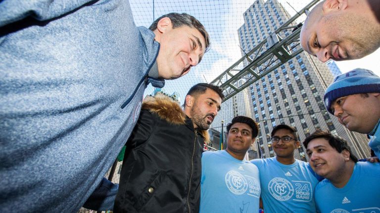 David Villa (second from the right) gives a pep talk to his team during the 2018 24-hour game.