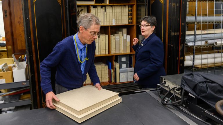 Municipal Archives offer a glimpse into New York City's history 2 Commissioner Pauline Toole, right, with Assistant Commissioner Kenneth Cobb by a safe that holds the oldest records in the Conservation Unit of the NYC Municipal Archives.