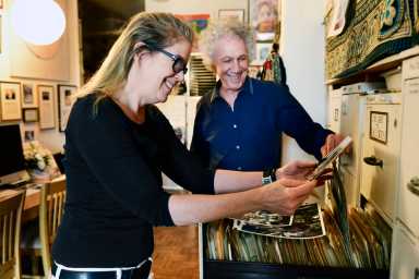L-R Elizabeth Gregory-Gruen, Bob Gruen going through the archives.