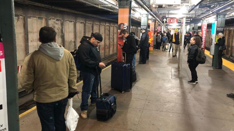 L trains mostly on schedule during first commute after tunnel repairs 3 Riders wait at the Bedford Avenue station for an L train during the Monday morning commute.