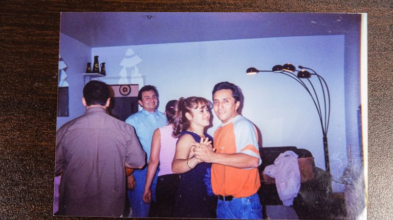 Cobos and wife Karina are seen in an undated family photo.