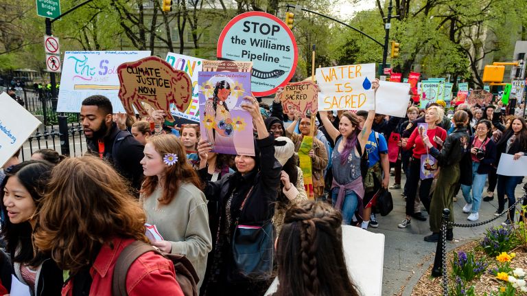 Protesters chant, carry signs, and march across the Brooklyn Bridge to protest the Williams pipeline, April 18, 2019.