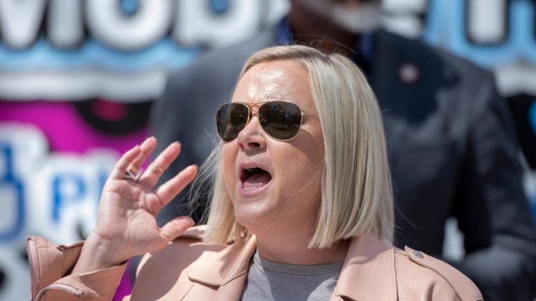Laura McQuade, president and CEO of Planned Parenthood of New York City, speaks at the ribbon-cutting ceremony.