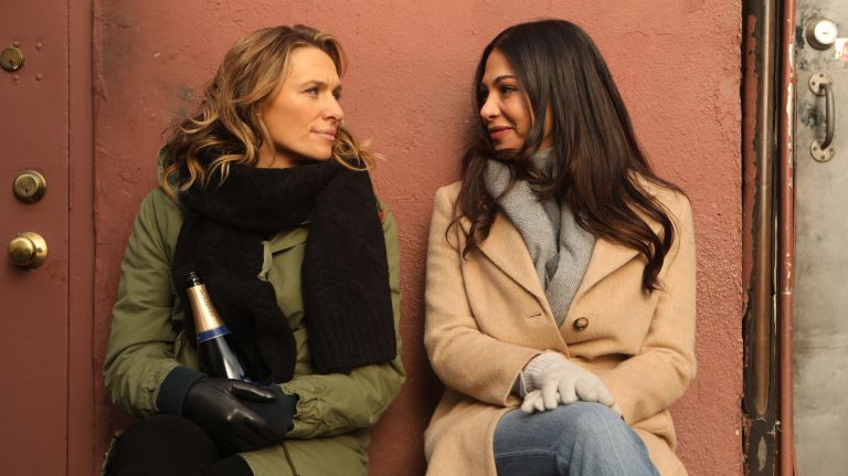 Michaela McManus as Sarah Campbell and&nbsp;Moran Atias as Ava Behzadi in "The Village" on NBC.