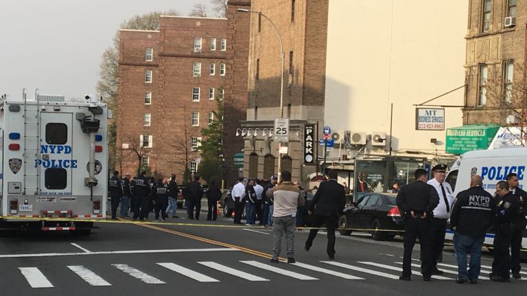 Police swarmed the area of 187th Street and Wadsworth Avenue in Washington Heights on Thursday after a police officer was shot and a suspect was killed in a hail of bullets, police said.