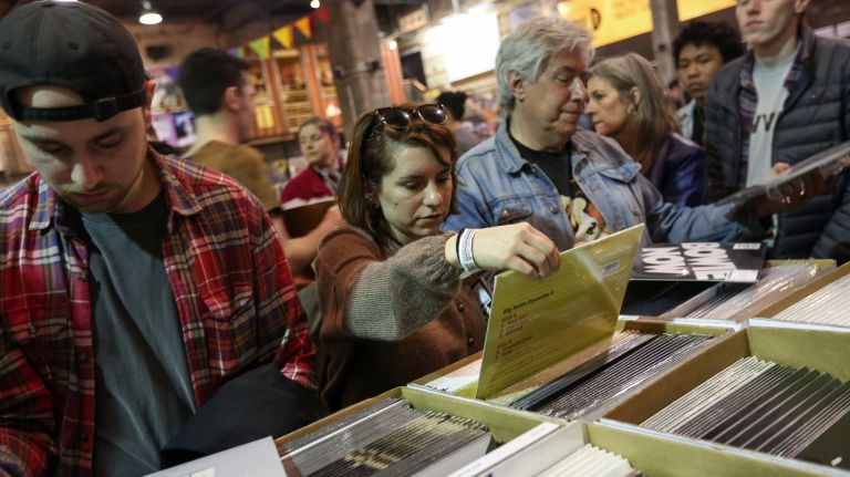 Record Store Day is a 'boon to business' for NYC's vinyl shops 2 Nikki Durso, from Flatbush, looks through the releases on sale on Record Store Day at Rough Trade, in Williamsburg, on April 21, 2018.