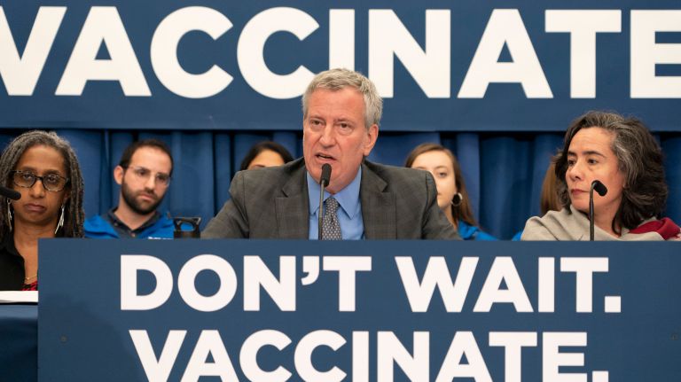 Deputy Mayor for Health and Human Services Dr. Herminia Palacio, left, New York City Mayor Bill de Blasio, center, and Health Commissioner Dr. Oxiris Barbot, right, announce that New York City has ordered mandatory vaccinations for residents of Williamsburg amid an outbreak that has largely affected the Orthodox Jewish community, Brooklyn on April 9, 2019.