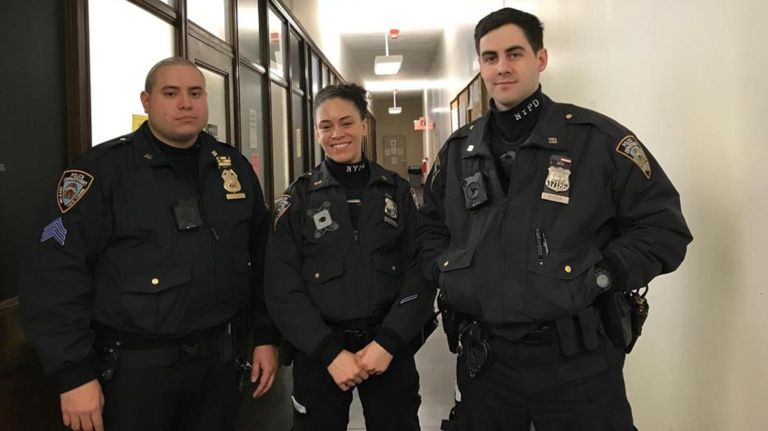 NYPD Sgt. William Rivera, left, Officer Delilah Solis and Officer Jack Etter credit a Domino's Pizza deliveryman with stopping a robbery suspect on the Upper West Side.