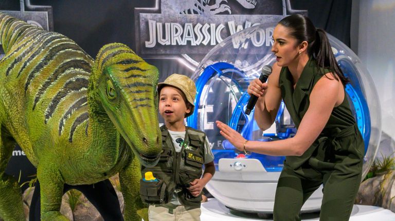 Madison Embrey who plays Kate in the show invites Jason Germaine, age 8, from Queens to take a picture with "Jeanie."