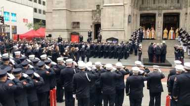 Fellow firefighters gather for funeral of Marine Christopher Slutman