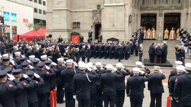 Fellow firefighters gather for funeral of Marine Christopher Slutman