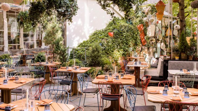 Narcissa offers a rustic backyard setting complete with plenty of brick walls and lanterns for evenings eating outdoors.&nbsp;