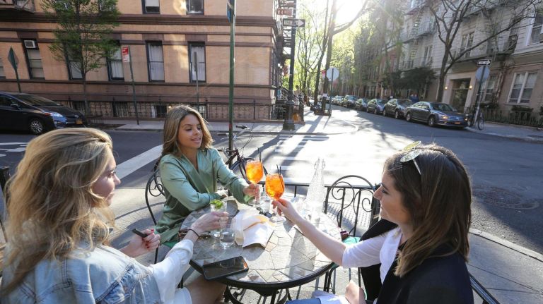 What to do and where to eat in the West Village 12 From left, Kate Nehra, Aisha DeMorsella, and Natalie Gilmool dine outside at Saint Ambrose on West 4th street on April 22.