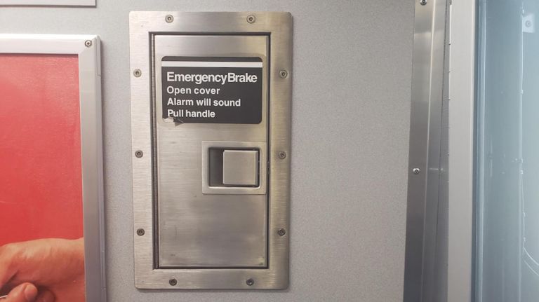 Emergency brakes in newer trains are covered, and opening the cover will set off an alarm.
