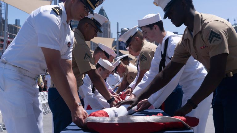 The annual ceremony takes place aboard the semi-permanently docked USS Intrepid.
