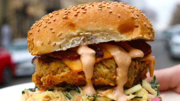 The Picnic Basket sandwich at Hartbreakers in Bushwick features seitan, green cabbage slaw, tangy pickled red onions, Cheddar cheese, seitan bacon and mondo sauce.
