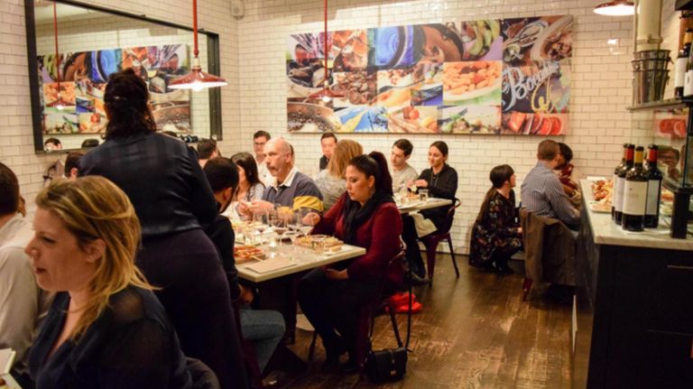 NYC markets update the classic food court with international flavors 6 Despaña Fine Foods & Tapas Café in SoHo combines a retail store with a cafe that sells tapas and drinks.