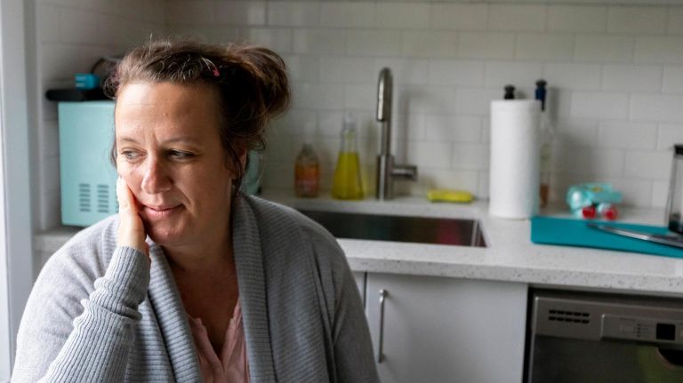 Greta Gertler Gold sits in the kitchen of her&nbsp;new apartment in Windsor Terrace, Brooklyn.