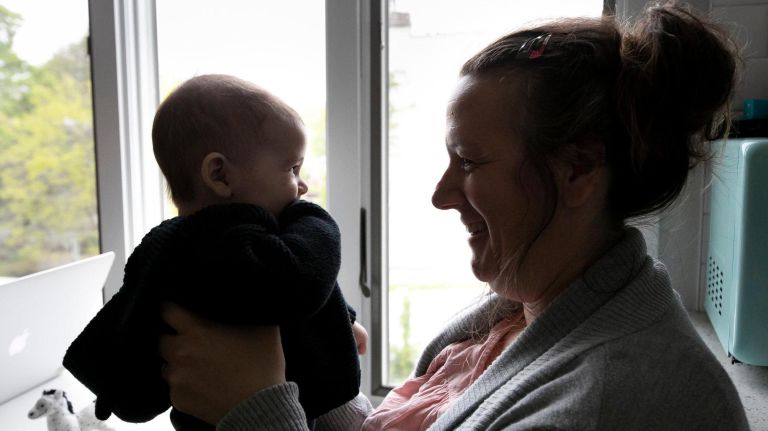 Greta Gertler Gold, with her 4-month-old son Eben, said she feels lucky to have quickly found a new apartment, but she's worried about what the long-term effects of the fire will be.