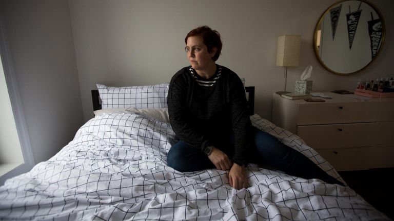 Eleanor Whitney looks out of the window in her new apartment in Greenwood Heights, just north of her old building in Sunset Park.