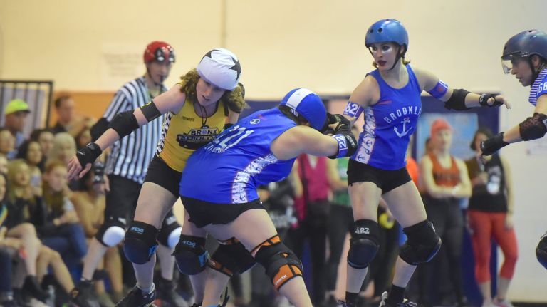 "Jammers" score points by surpassing opposing players on the track, so the other players, called blockers, do their best to stop them.