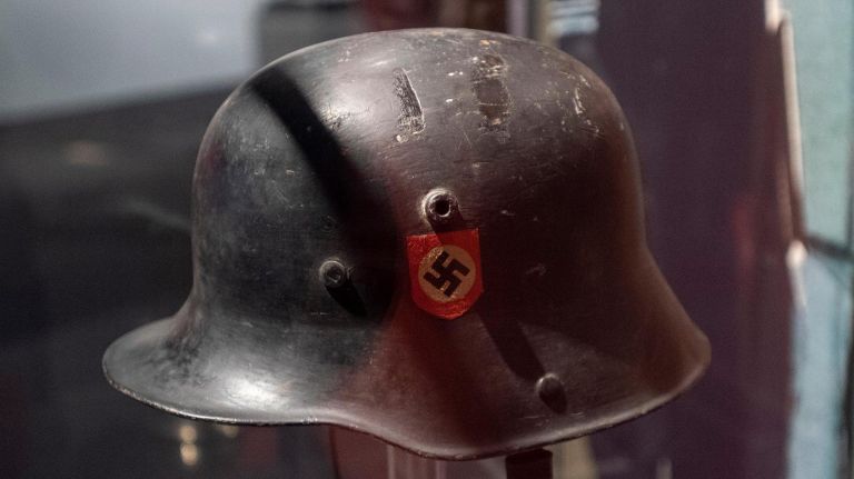 'Auschwitz. Not long ago. Not far away.' brings Holocaust horrors to the present 4 An SS helmet owned by Heinrich Himmler, the primary architect of the Holocaust.