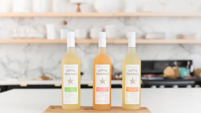 Austin Cocktails' pre-mixed drinks include a Cucumber Mojito, from left, Fred's Ruby Red and the Perfect Bergamot Orange Margarita.