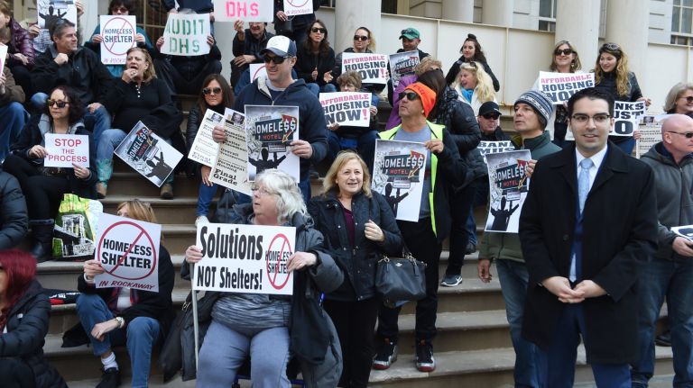 Councilman Eric UIlrich led protestors from Rockaway, Queens, against a DHS proposal to build a homeless shelter on Beach 101st Street in his Rockaway district.